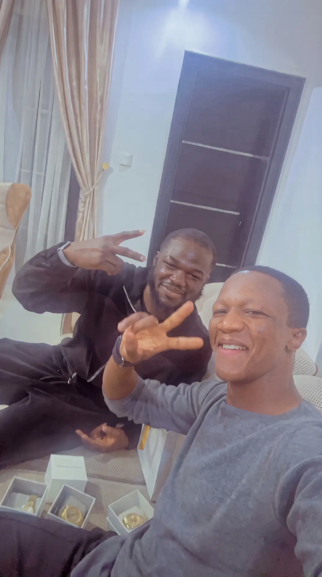 Adam and Ahmed sharing a relaxed moment in Nigeria in 2023.